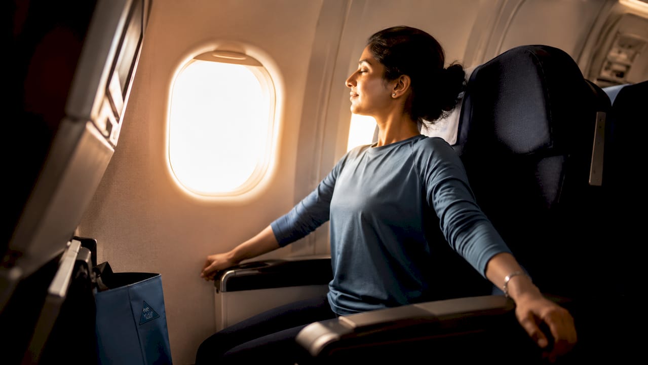 Close-up of hands practicing subtle airplane yoga